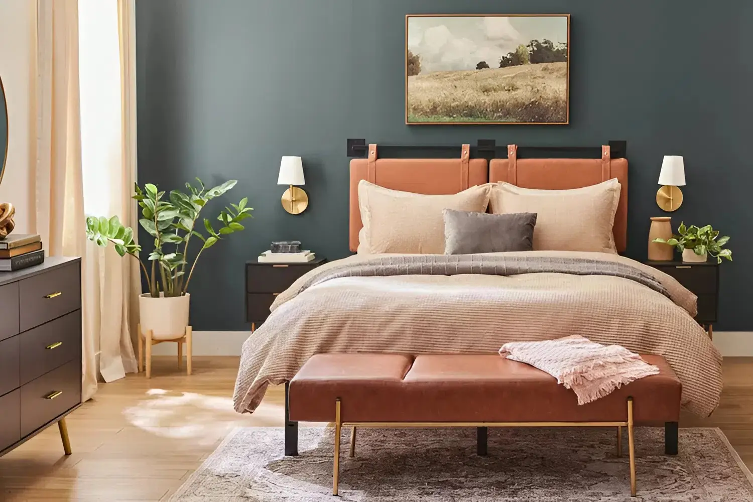 Bedroom with dark green accent wall and warm tones by an interior painter in Visalia, CA