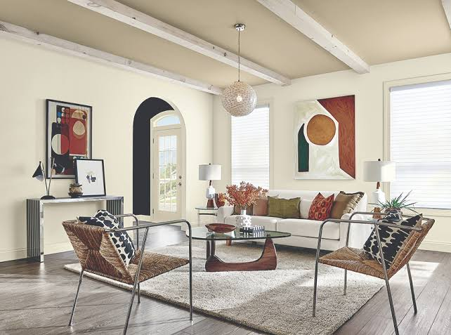 Living room with warm neutral walls, crisp trim, and a professionally coordinated color palette by an interior painter in Three Rivers, CA.