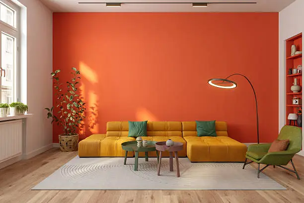 Living room with a bold terracotta accent wall and clean finishes by a house painter in Selma, CA.